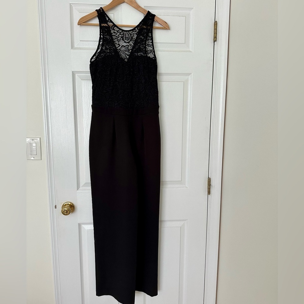 XOXO black jumpsuit with lace detail size Small.